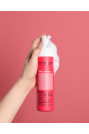 Mousse modellante per capelli ricci